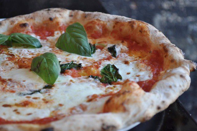 (Photo courtesy of Forcella)Forcella: If you told us a year ago that a serious Motorino contender would be opening up just blocks from Mathieu Palombino's Williamsburg stronghold we would have laughed at you. But then Forcella opened, just last month. The small pizzeria doesn't look like much from the outside, but what does that matter? The inside is charming and chef Giulio Adriani's pies are the real deal. The restaurant makes its own mozzarella, and the pies that come out of its imported Italian oven are pitch perfectâif not all necessarily ones you are used to. In addition to the expected standards Forcella also boasts some unique pizzas, including a deep fried pizza (in which the dough is deep fried before being finished with the toppings in the oven), a carbonara pizza (exactly what it sounds like) and our recent obsession, the Vomero (a white pie topped with mozzarella, ham, cream, ricotta and corn; trust us). Forcella, like Motorino before it, is already planning a second outpost in Manhattan and we eagerly await that day. And hopefully by then they'll have dealt with their one downside: a not particularly on-the-ball staff. (Garth Johnston) 485 Lorimer St, Brooklyn, (718) 388-882